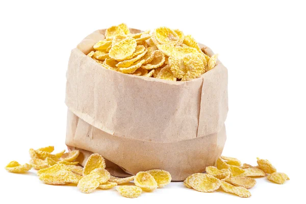 Flocos de milho em um saco de papel . — Fotografia de Stock