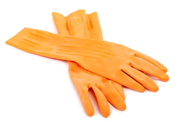 Deux gants en caoutchouc orange sur fond blanc — Photo