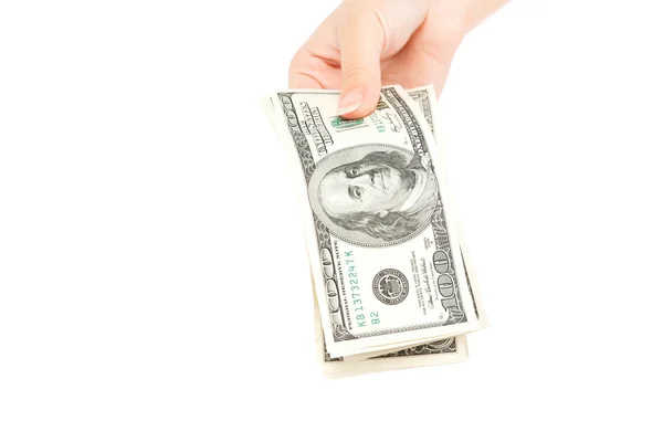 Beautiful female hand holding a stack of banknotes. — Stock Photo, Image