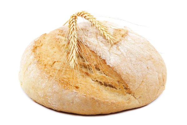 Bread and wheat ears on white background. — Stock Photo, Image