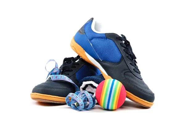 Sport skor, utrustning och måttband. — Stockfoto
