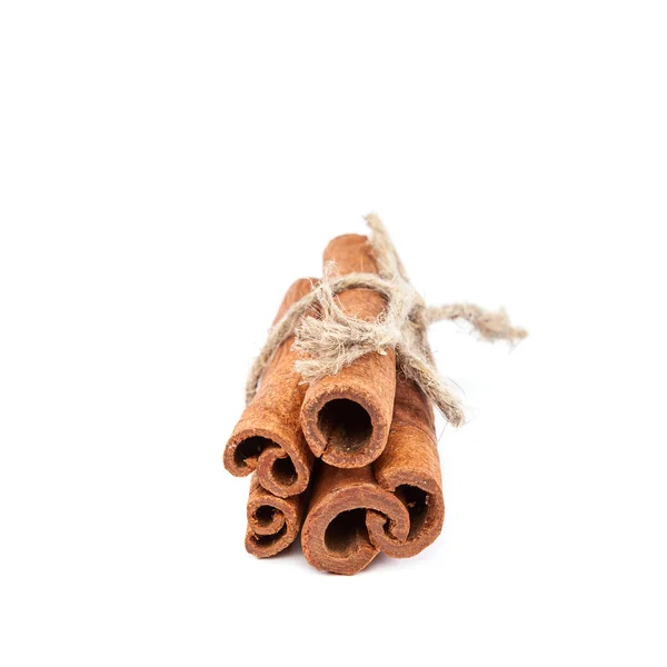 Bundle of cinnamon sticks on white background. — Stock Photo, Image