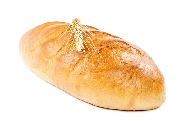 Pain pain et épi de blé sur fond blanc . — Photo