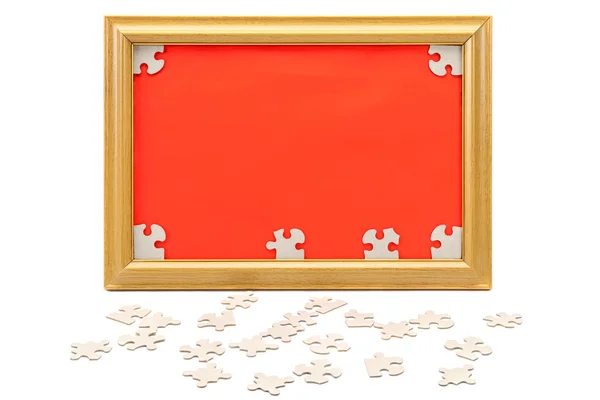 Image in the frame and scattered puzzle. — Stock Photo, Image