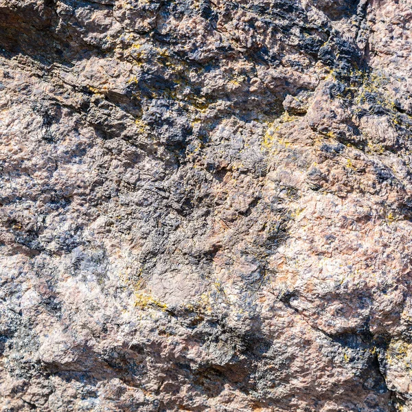 Textura sobre la superficie de la piedra como fondo . — Foto de Stock