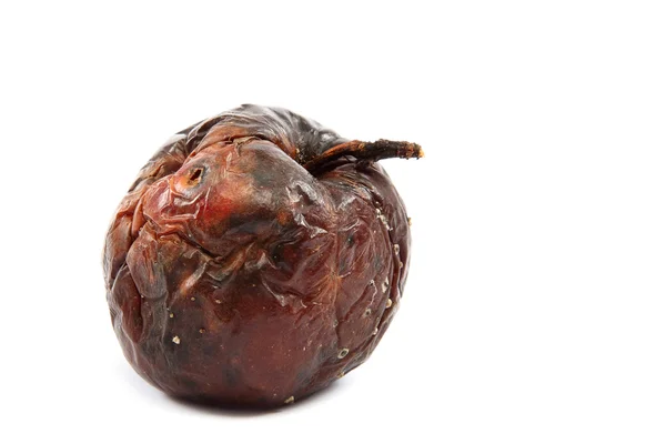 Rotten apple på vit bakgrund. — Stockfoto