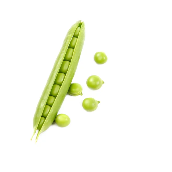 Green peas on a white background. — Stock Photo, Image