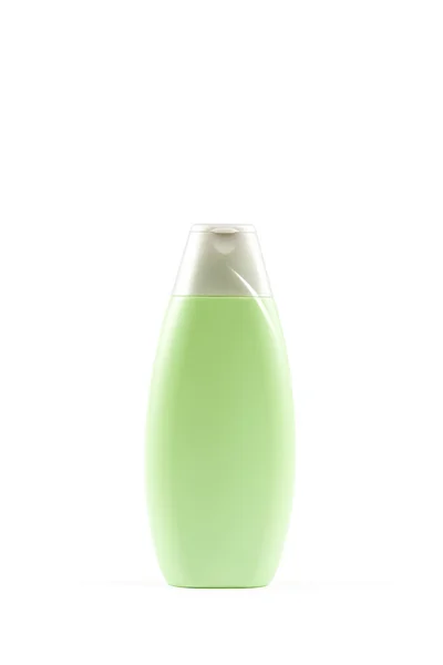 Пластиковая бутылка шампуня на белом фоне . — стоковое фото