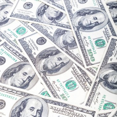 Yüz dolarlık banknotlar bir yığın bir arka plan olarak