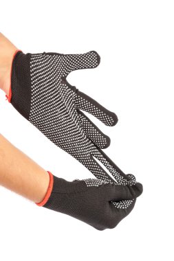 Beyaz zemin üzerinde bir yandan çalışma eldiveni.