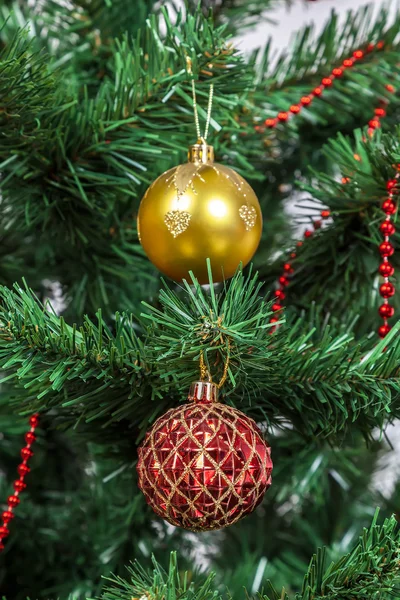 Christmas tree decorated with colorful New Year balls. — Stock Photo, Image