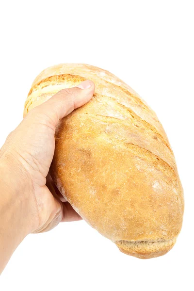 Pão fresco na mão sobre fundo branco . — Fotografia de Stock