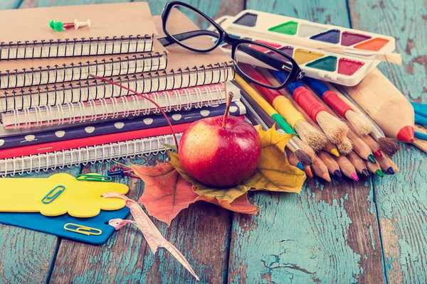 Office or school supplies on wooden planks. — Stock Photo, Image