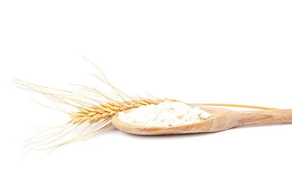 Punte di grano e farina in un cucchiaio di legno . — Foto Stock