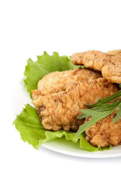 Filetes y lechuga sobre fondo blanco . — Foto de Stock