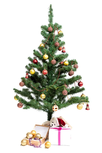 Christmas tree with baubles and gifts. — Stock Photo, Image