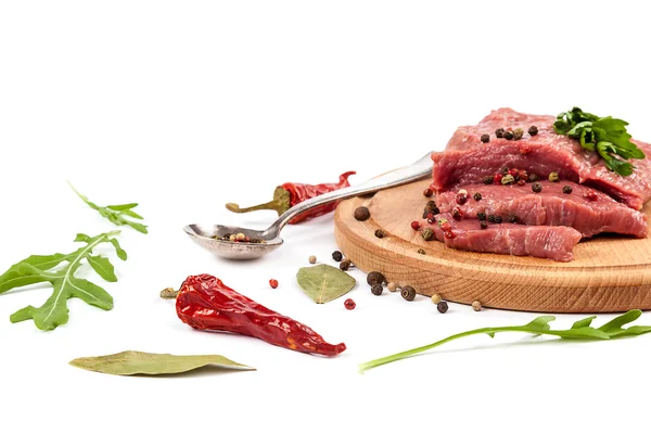 Meat on a cutting board on white background. — Stock Photo, Image