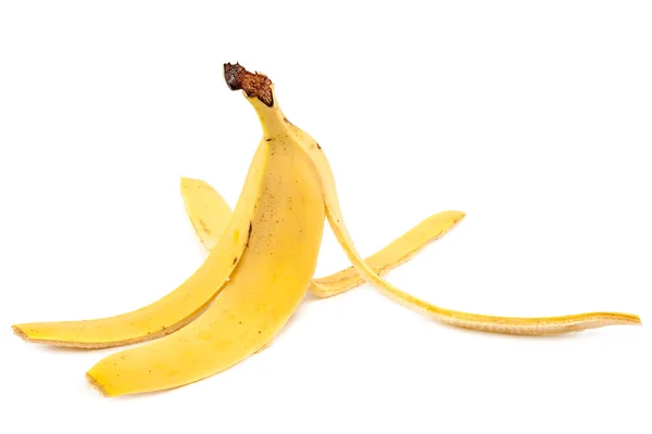 Peau de banane sur fond blanc. — Photo