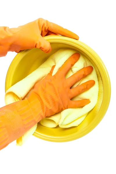 Hands in rubber gloves washing the plastic dish towel — Stock Photo, Image