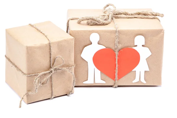 Cajas con regalos con corazón, silueta niño y niña . —  Fotos de Stock