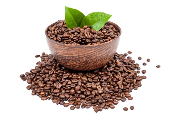 Coffee beans with green leaves in pottery — Stock Photo, Image