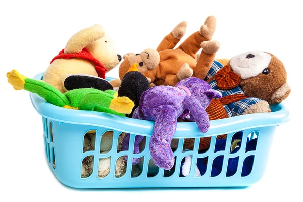 Plastic laundry basket with soft toys — Stock Photo, Image