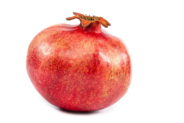 Färskt granatäpple på vit bakgrund. — Stockfoto