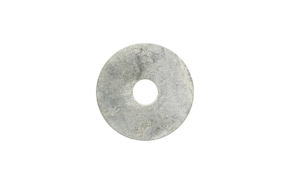 Pedra redonda com furo isolado no fundo branco — Fotografia de Stock