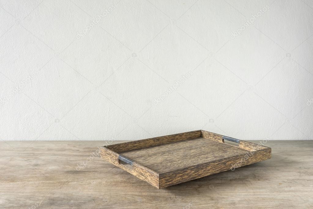 Wooden tray on wooden table