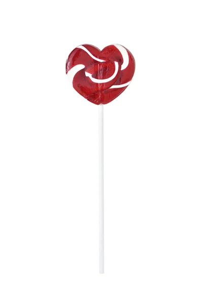 Heart shaped candy lollipop with red and white swirls have stick — Stock Photo, Image