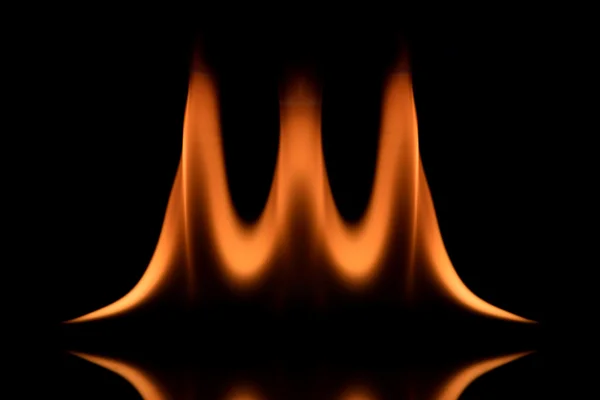 Three fire wave in dark with reflex (Low key) — Stock Photo, Image