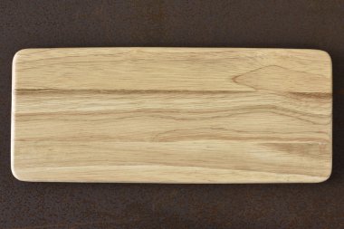 Ahşap plaka paslı arka plan üzerinde