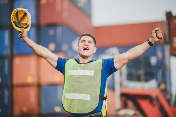 engineer foreman working in container terminal in term of industry logistic cargo shipping to export and import, warehouse delivery business freight transport, loading control in port with safety