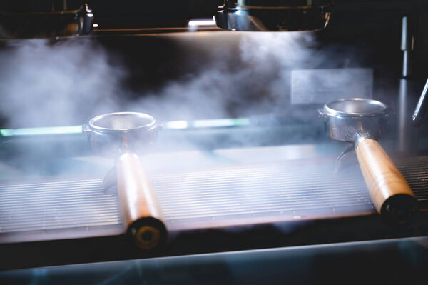 professional barista making espresso coffee to a drink cup in cafe, beverage caffeine machine, person pouring hot water with hand, business in the morning breakfast, fresh aroma in hot drink