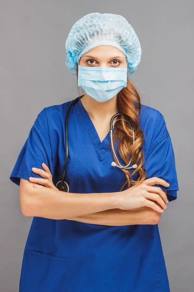 Mulher médico no uniforme azul — Fotografia de Stock