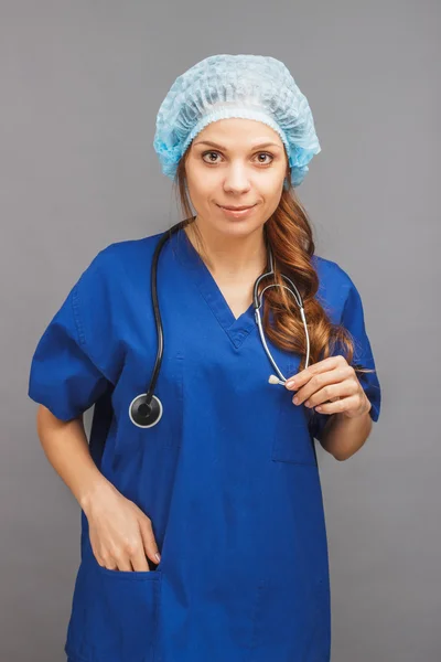 Mulher médico no uniforme médico — Fotografia de Stock