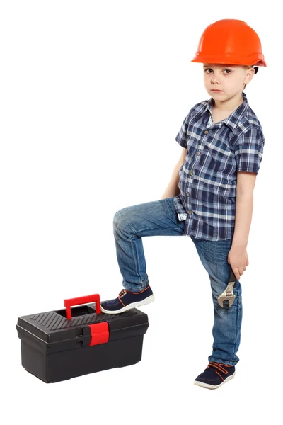 Niño en el casco de construcción — Foto de Stock