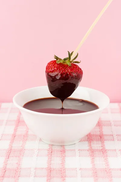 Strawberries with chocolate topping — Stock Photo, Image