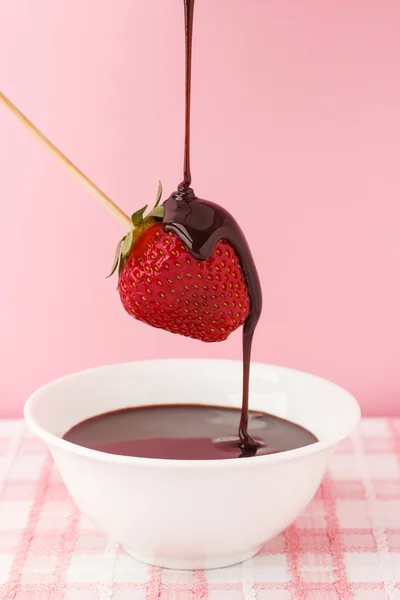 Strawberries with chocolate topping — Stock Photo, Image