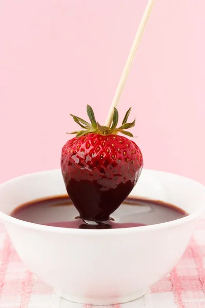 Strawberries with chocolate topping — Stock Photo, Image