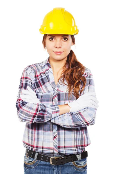 Jovem mulher em capacete de construção amarelo — Fotografia de Stock