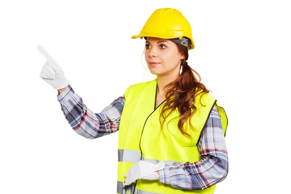 Jonge vrouw in bouw helm en geel shirt — Stockfoto
