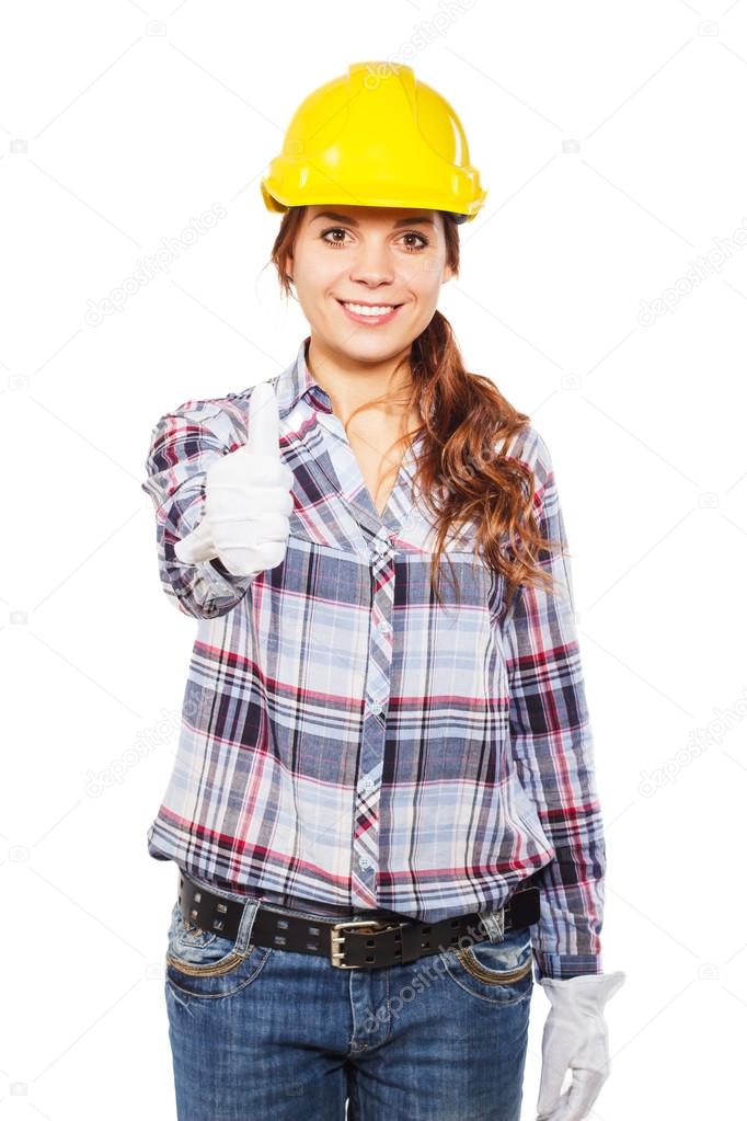 Young woman in construction helmet and check shirt