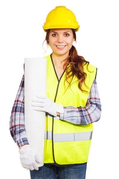 Jeune femme en casque de construction et gilet jaune — Photo