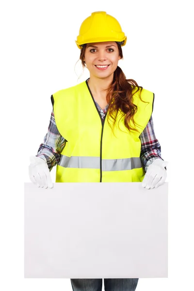 Jeune femme dans la construction casque avec plaque signalétique — Photo