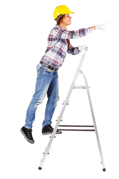 Jonge werknemers staat op de trap kijkt rechtdoor — Stockfoto