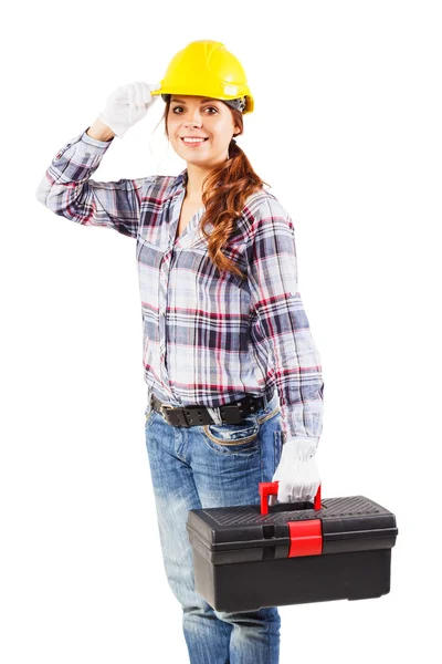 Joven trabajador sonriente en un casco de construcción —  Fotos de Stock