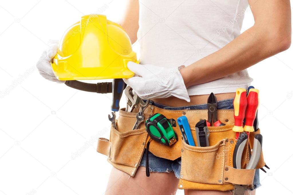 Woman builder with set of construction tools, isolated