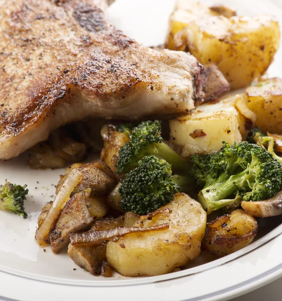 Pork chops with vegetables — Stock Photo, Image