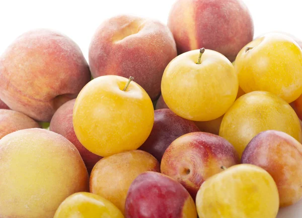 Plums and peaches Royalty Free Stock Images
